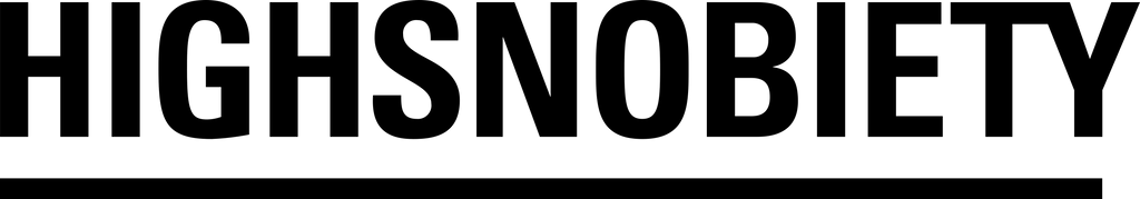 Black silhouette illustration of a house with a chimney and window.