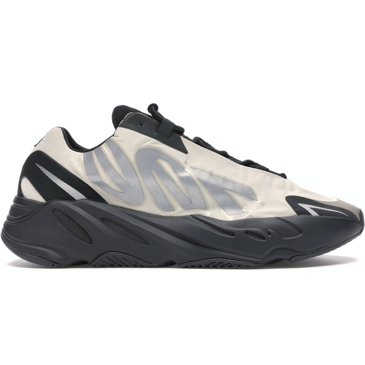 adidas Yeezy Boost 700 MNVN Bone sneakers in white and black with seamless overlays and elastic laces.