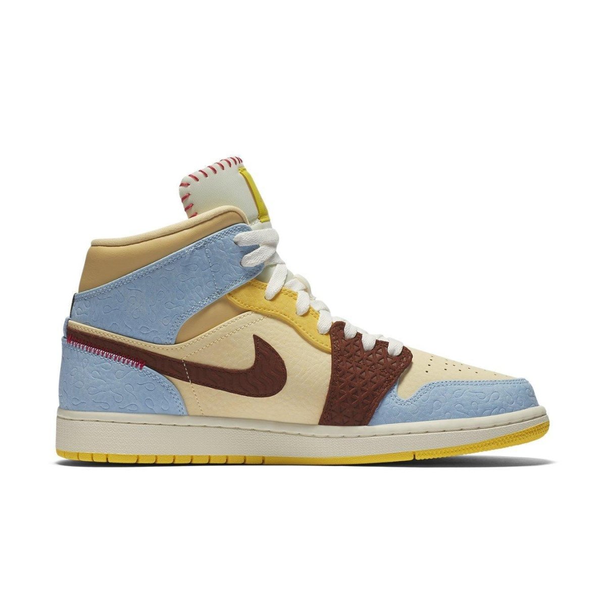Jordan 1 Mid SE Fearless Maison Chateau Rouge sneaker with unique colors and patterns inspired by African heritage.