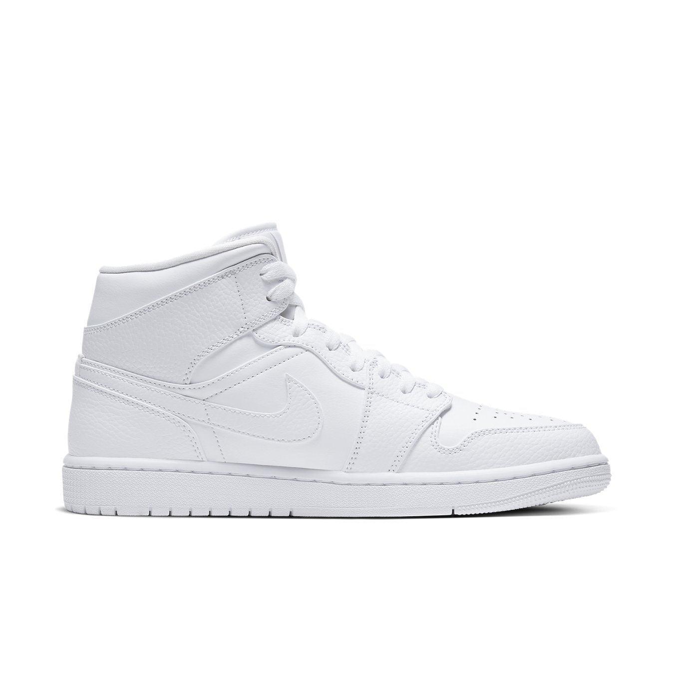 Air Jordan 1 Mid Triple White 2.0 (2020) featuring a sleek, all-white leather design and Nike swoosh.