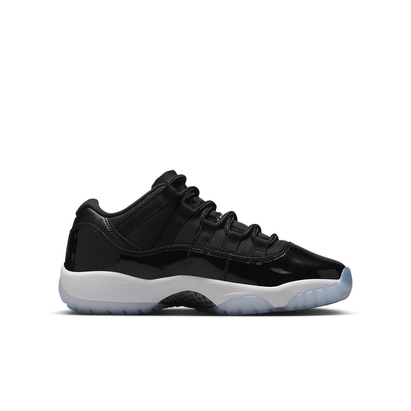 Air Jordan 11 Retro Low Space Jam GS sneaker in black mesh with patent leather and icy sole.