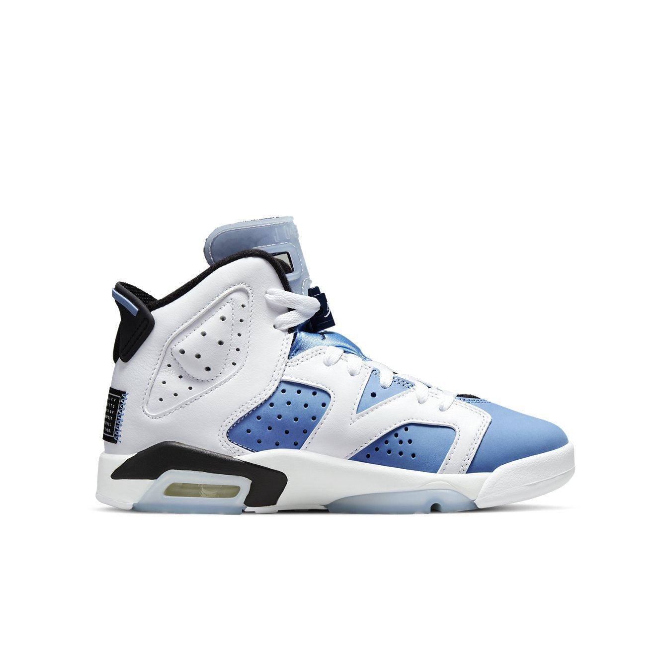 Jordan 6 Retro UNC White (GS) sneaker in white and blue, featuring classic design and Air-sole cushioning.
