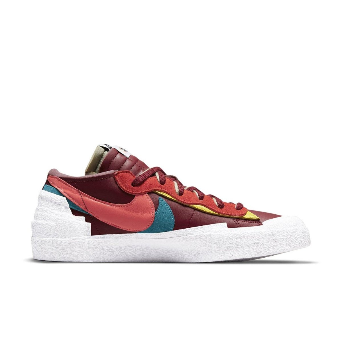 Nike Blazer Low sacai KAWS Red featuring bold dark red leather and contrasting details from the collaboration.