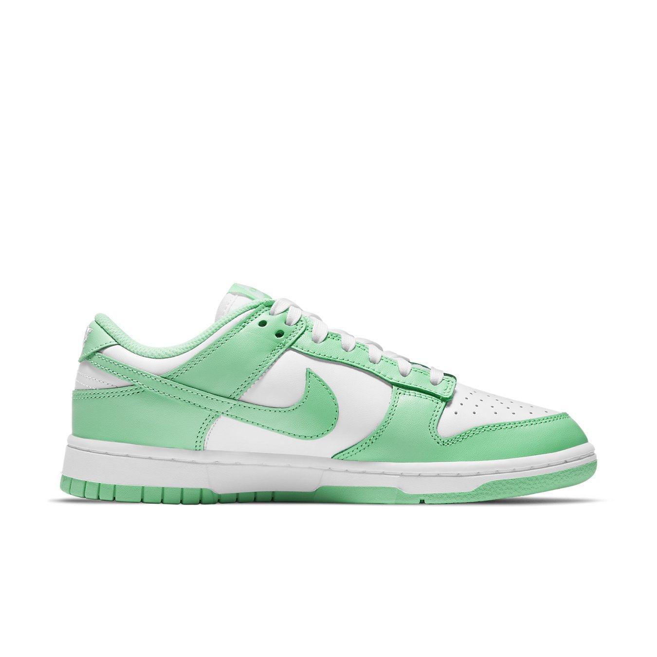 Nike Dunk Low Green Glow women's sneaker in white and aqua green colorway, showcasing classic leather design and color blocking.