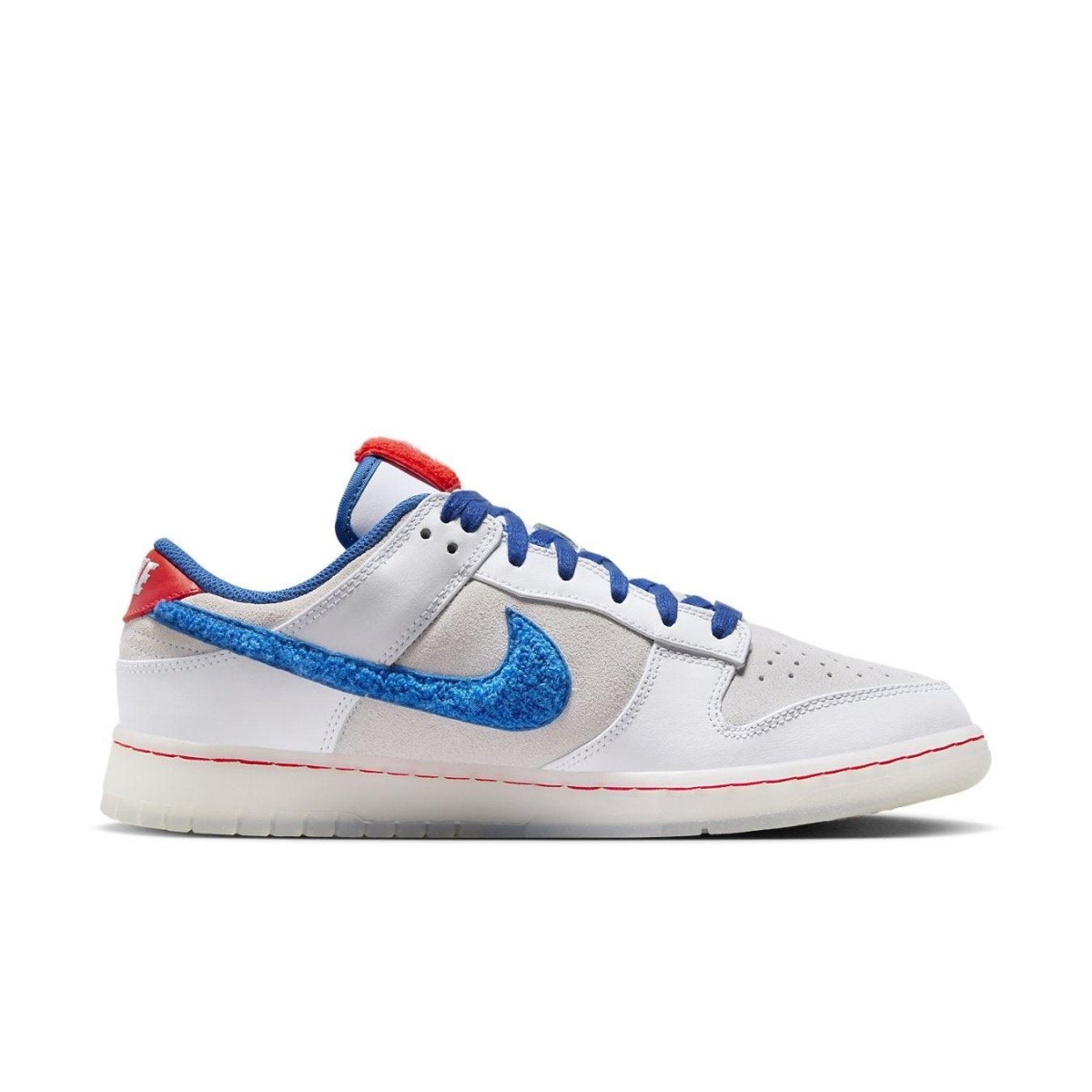 Nike Dunk Low Retro PRM Year of the Rabbit with white suede, blue Swoosh, and red accents celebrating Lunar New Year.
