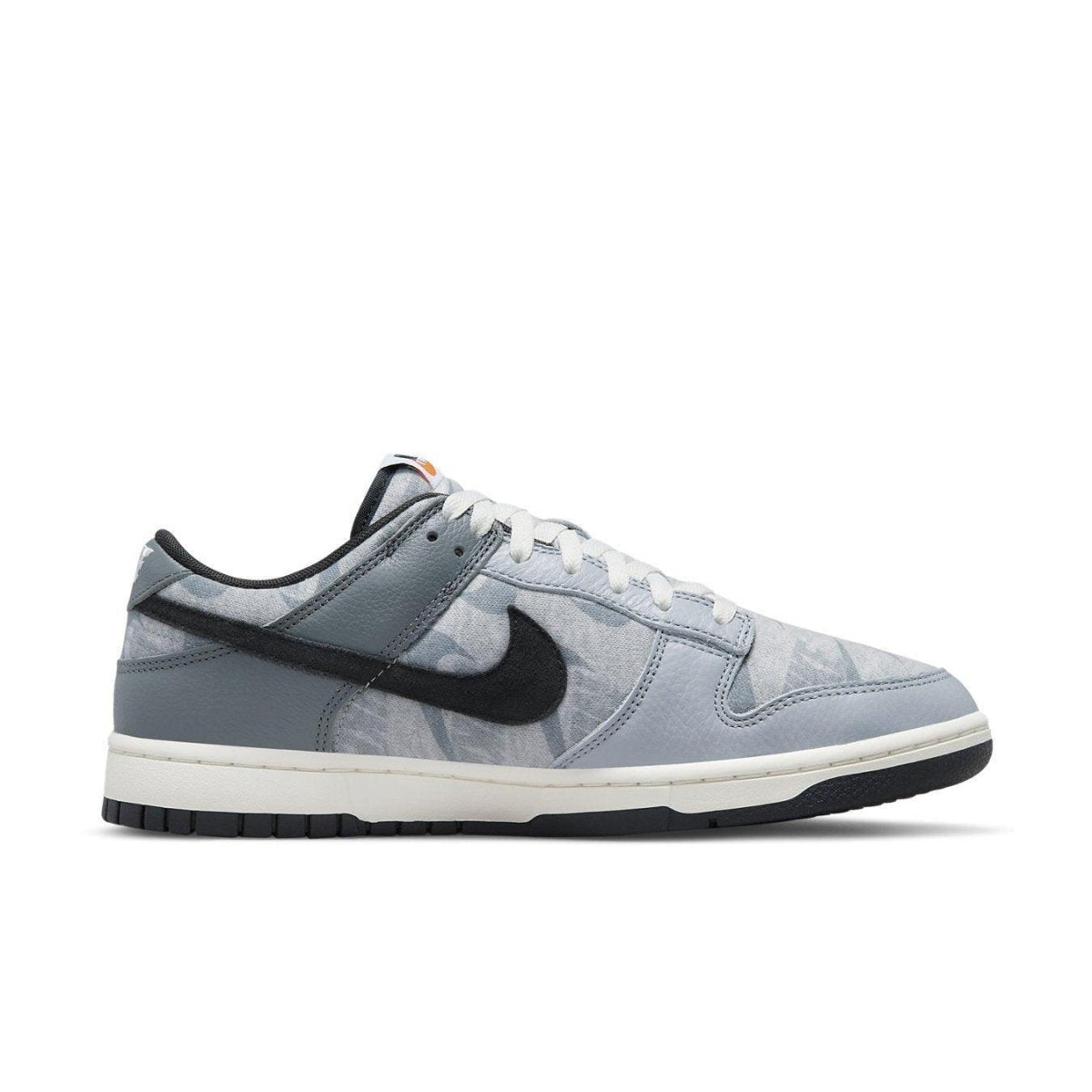 Nike Dunk Low SE Copy Paste in grey and black, featuring a sleek design and stylish silhouette.