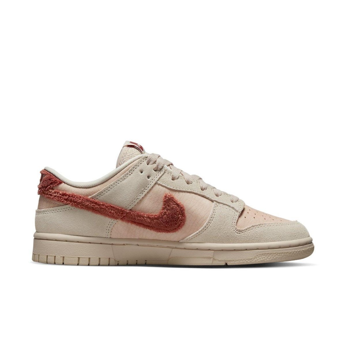 Nike Dunk Low Terry Swoosh (W) in beige with unique sponge material and a red fuzzy Swoosh logo.
