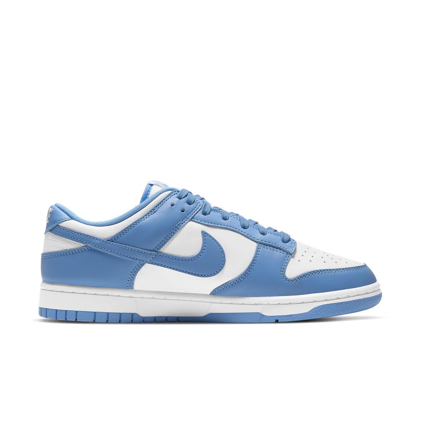 Nike Dunk Low UNC (2021) sneaker in University Blue and white colorway with sleek design.