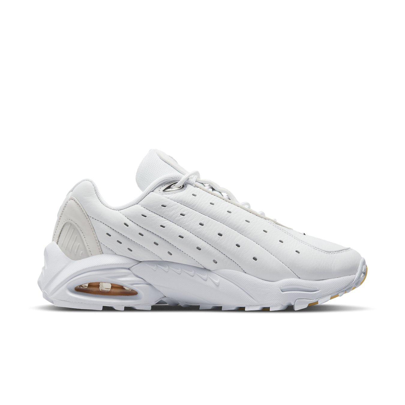 Nike Hot Step Air Terra Drake NOCTA in white leather with perforated details and mini-Swoosh design.