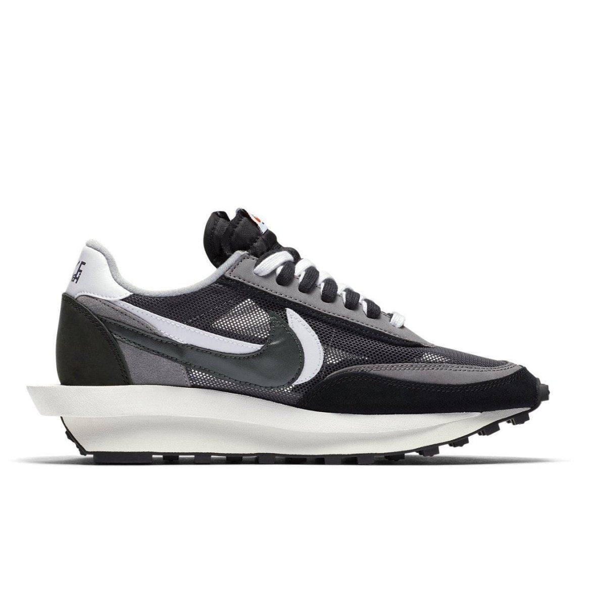 Nike LD Waffle Sacai Black sneaker featuring black and grey mesh with co-branded details.