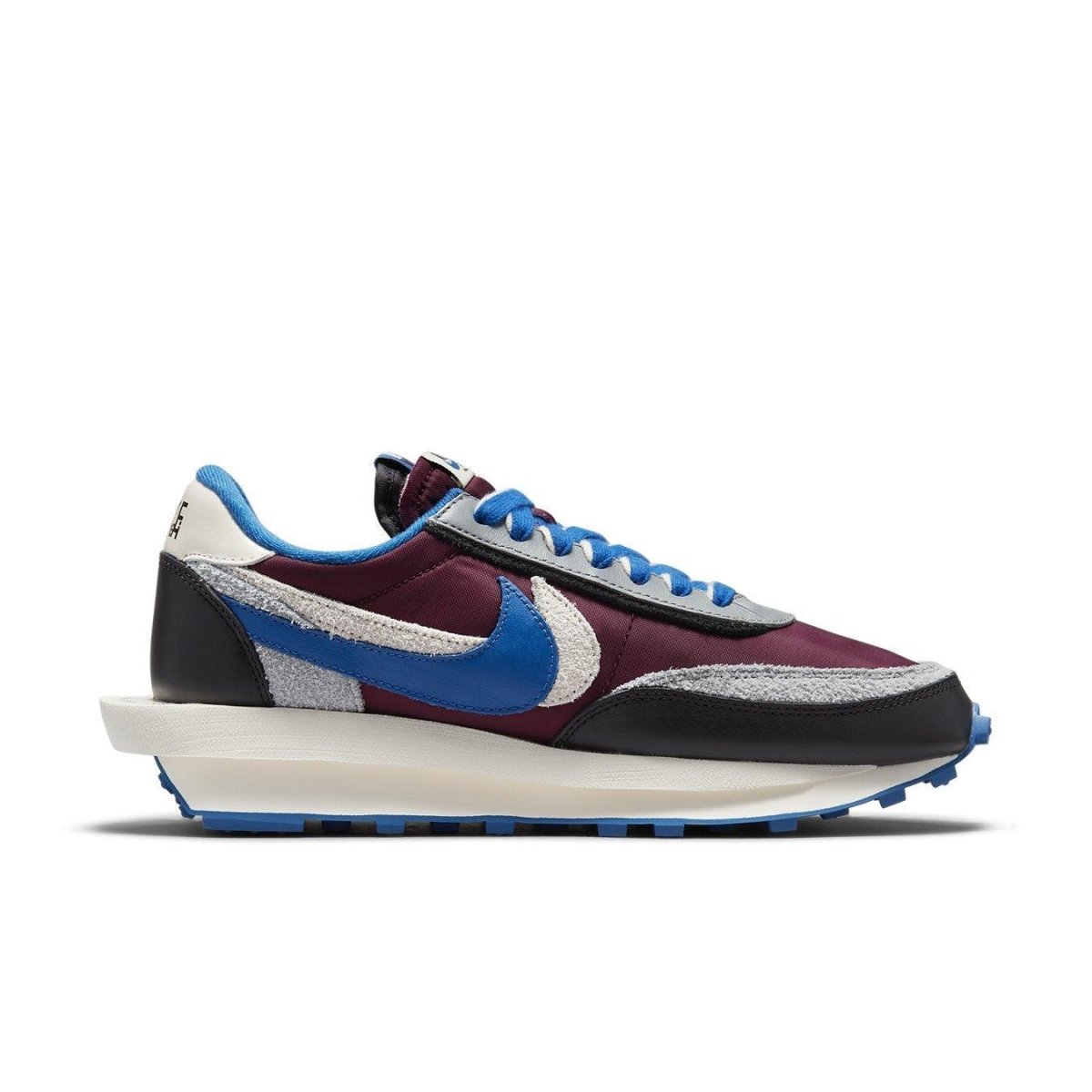 Nike LD Waffle sacai Undercover in Night Maroon and Team Royal with hybrid silhouette and contrasting colors.