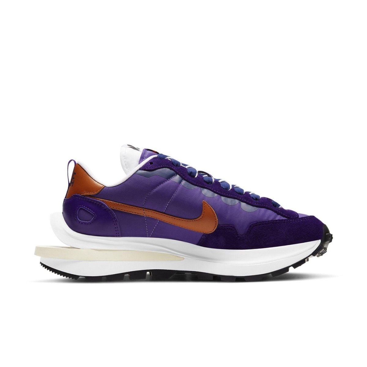 Nike Vaporwaffle sacai Dark Iris sneaker in purple nylon with burnt orange accents and retro silhouette