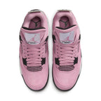 Top view of Women's Air Jordan 4 Retro 'Orchid' sneakers in soft lilac suede with black accents.
