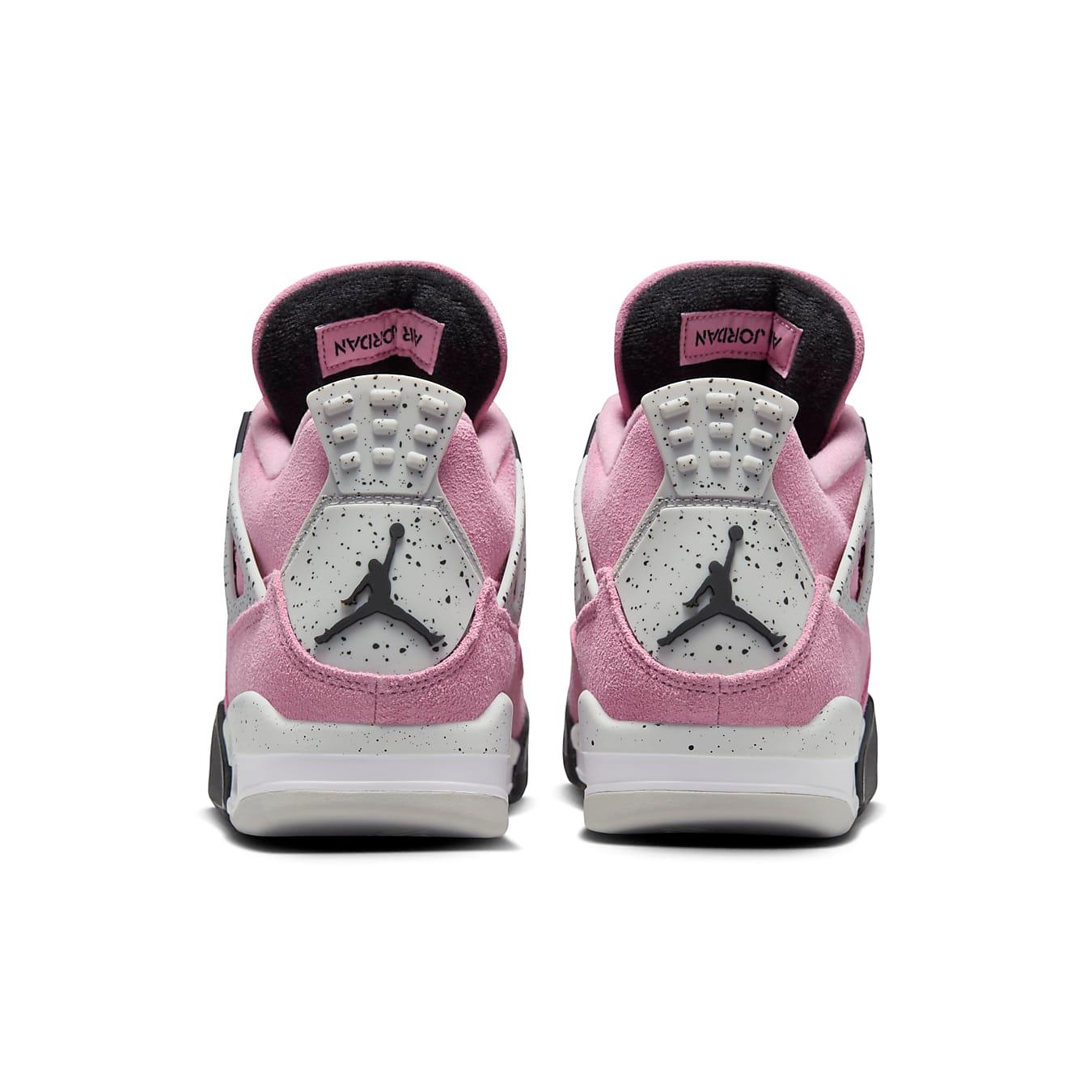 Rear view of Women's Air Jordan 4 Retro 'Orchid' in lavender suede with classic Jumpman logo.