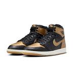 Air Jordan 1 Retro High OG Black Metallic Gold sneakers featuring sleek black leather and metallic gold accents.