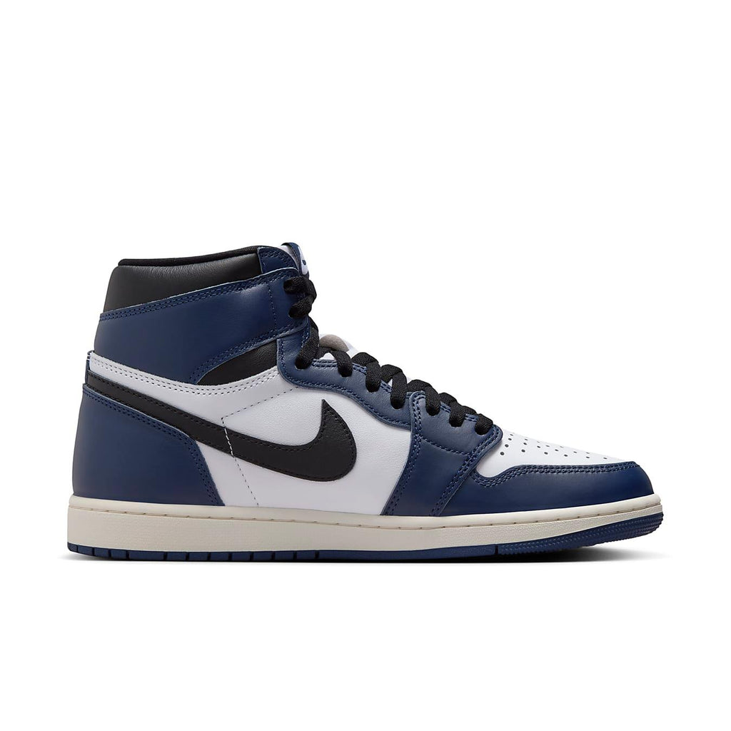 Nike Air Jordan 1 Retro High OG Midnight Navy side view, featuring navy and white leather, iconic design.