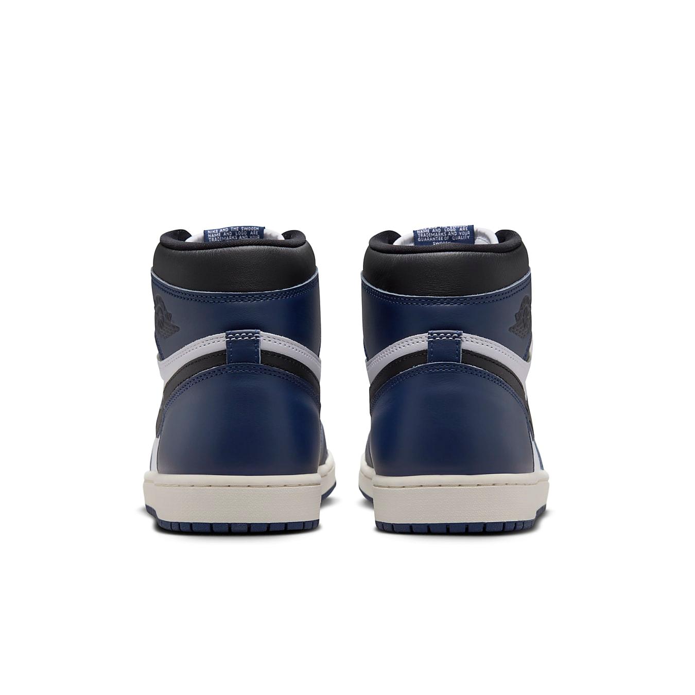 Back view of Jordan 1 Retro High OG Midnight Navy sneakers showcasing navy and white design.