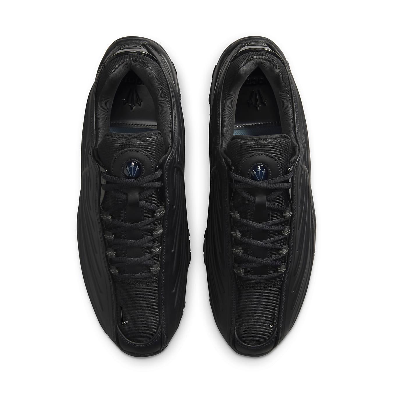 Nike Hot Step 2 Drake NOCTA Black sneakers from above, featuring sleek black synthetic leather and co-branded elements.