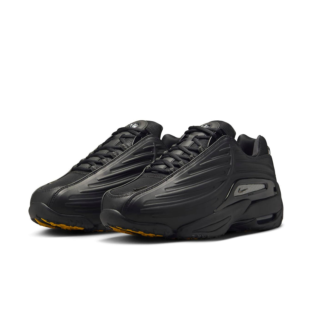 Nike Hot Step 2 Drake NOCTA Black sneakers featuring sleek synthetic upper and iconic Swoosh design.