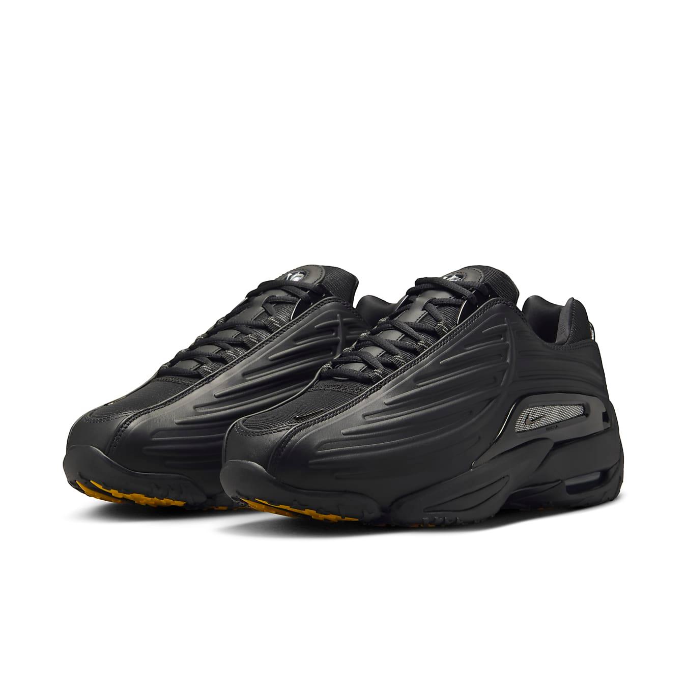Nike Hot Step 2 Drake NOCTA Black sneakers featuring sleek synthetic upper and iconic Swoosh design.