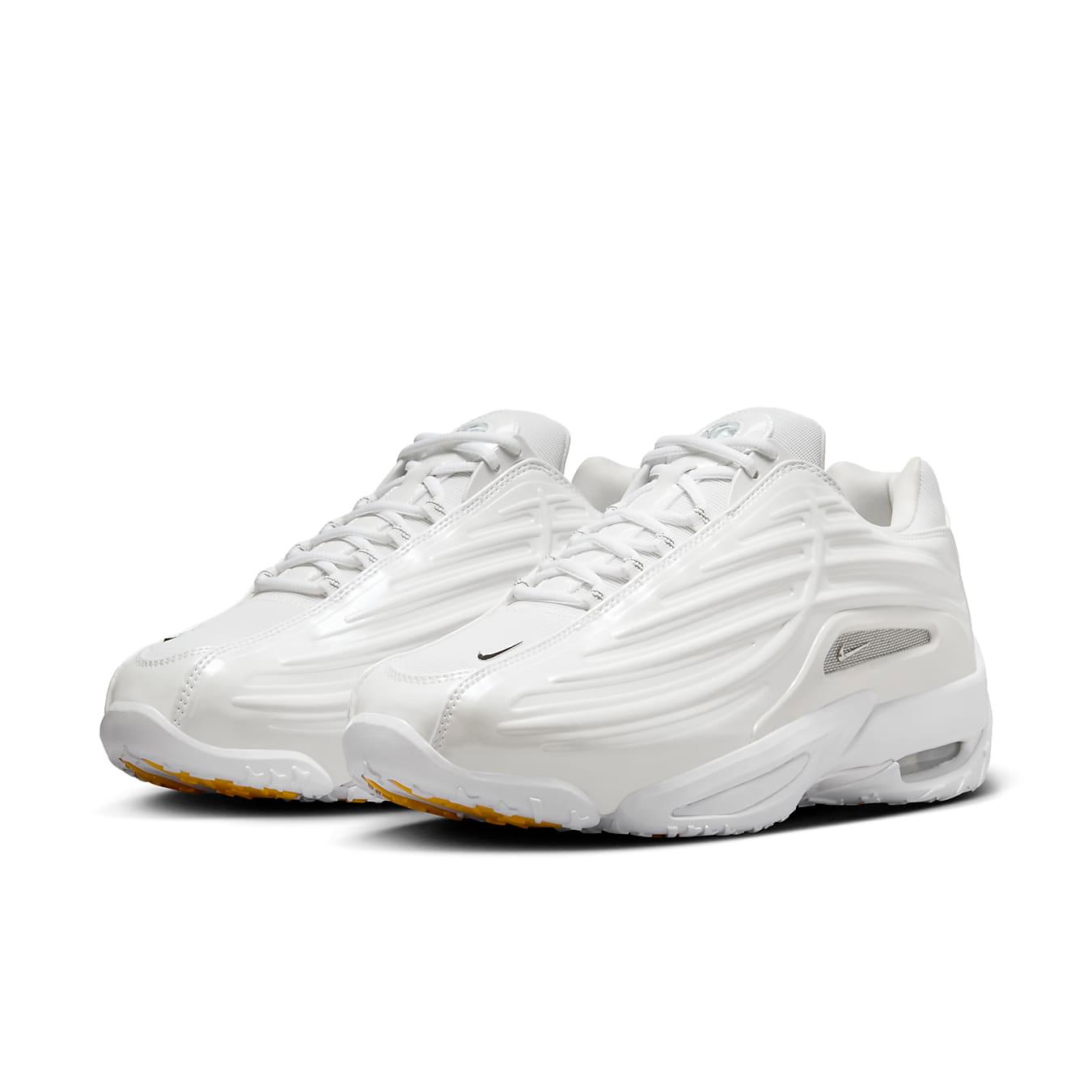 Nike Hot Step 2 Drake NOCTA sneakers in white with 3D molded sides and reflective finish for a sleek lifestyle look.