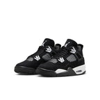 Air Jordan 4 Retro GS 'White Thunder' sneakers showcasing black nubuck upper and contrasting white accents.