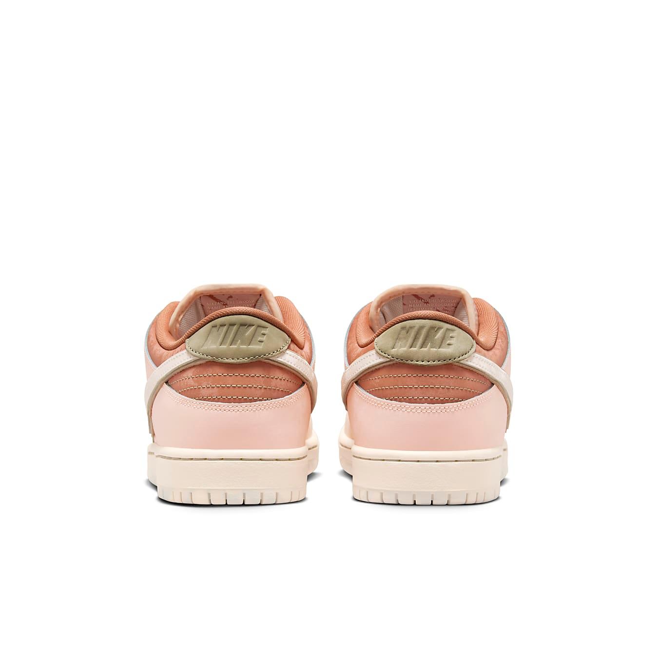 Nike SB Dunk Low Trocadéro Gardens back view showcasing pink and brown colorway with beige accents.