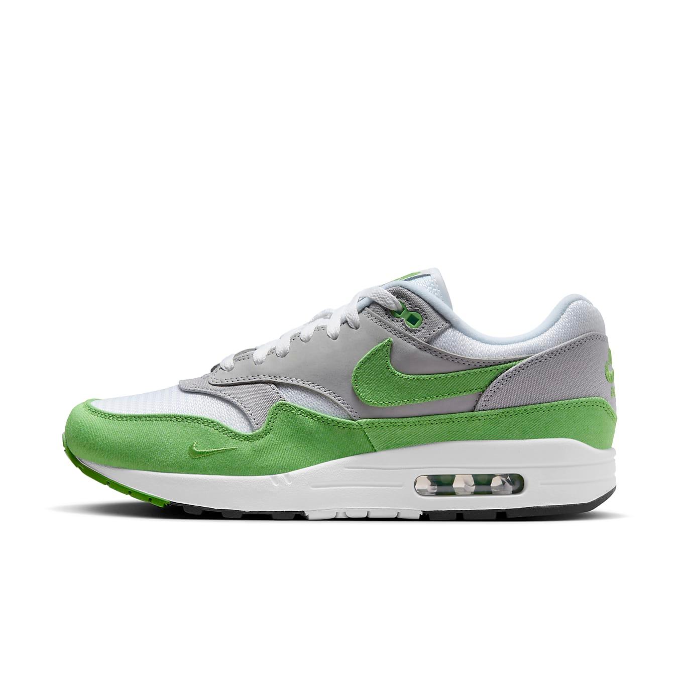 Nike Air Max 1 Patta 20th Anniversary Chlorophyll sneaker in white, grey, and bright green colorway.
