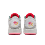 Air Jordan 3 Retro Wings sneakers featuring white leather upper and floral design on heel.