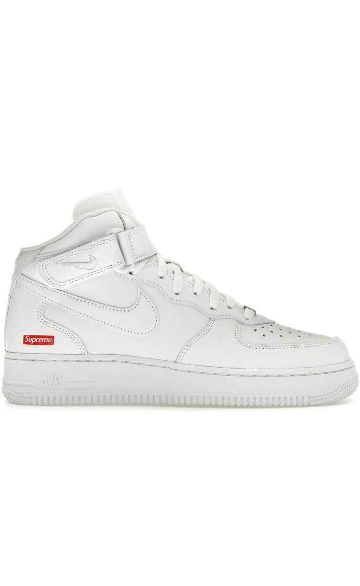 Nike Air Force 1 Mid Supreme White shoes with logo, featuring leather upper and padded collar for comfort.