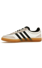 adidas Gazelle Indoor Bad Bunny in Core White with black stripes and gum sole, stylish leather and suede design.