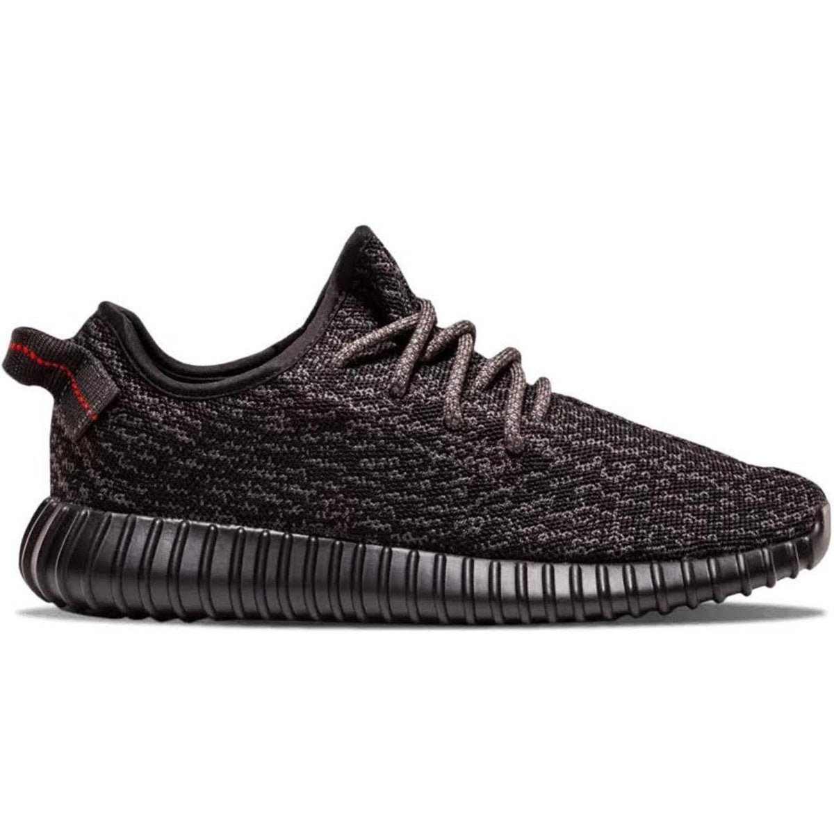 Adidas Yeezy Boost 350 Pirate Black 2015, featuring black Primeknit upper, suede patches, and black Boost sole.