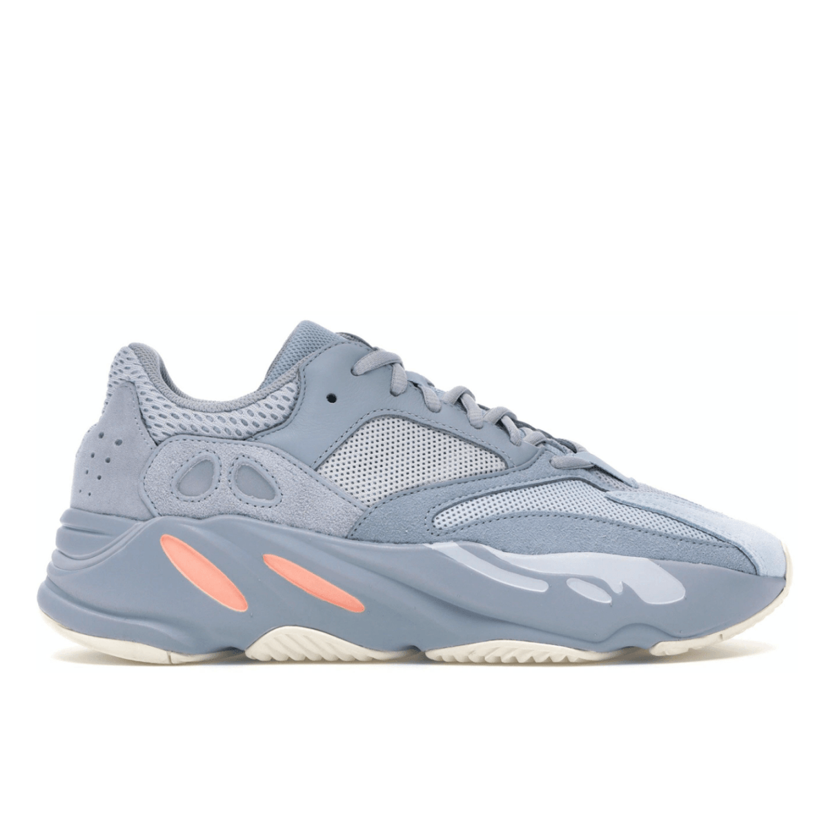 Adidas Yeezy Boost 700 Inertia in grey and light orange, featuring premium suede and breathable mesh.
