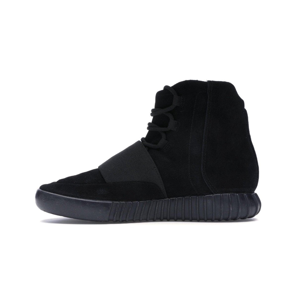 adidas Yeezy Boost 750 Triple Black featuring sleek black suede upper and tubular sole design.