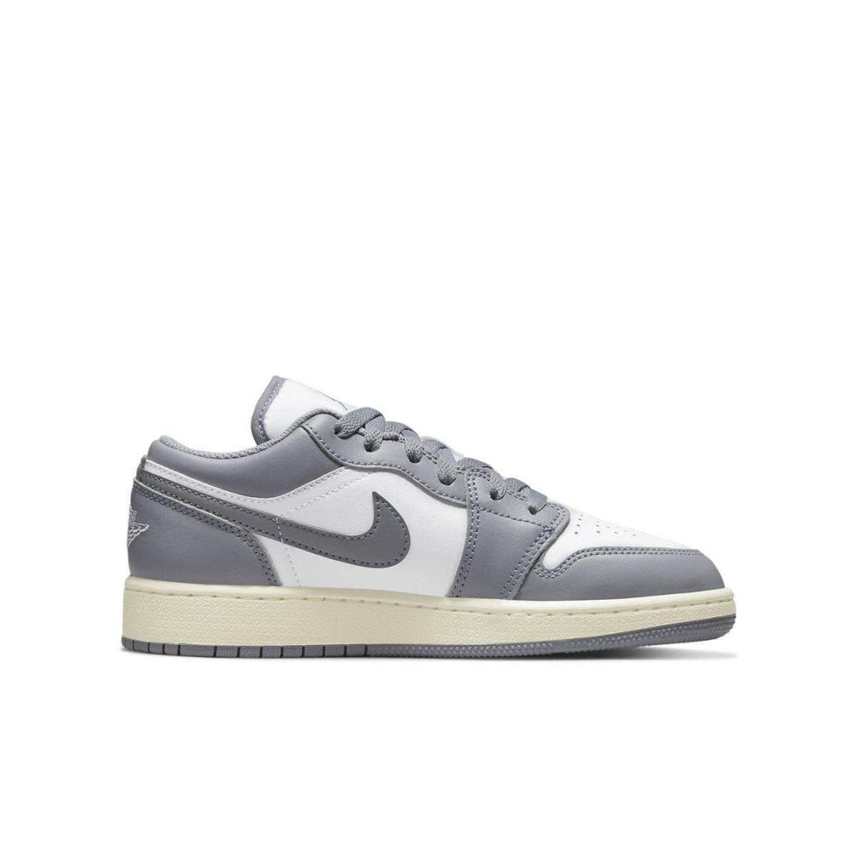 Air Jordan 1 Low Vintage Grey GS kids' sneakers with white and gray leather upper.