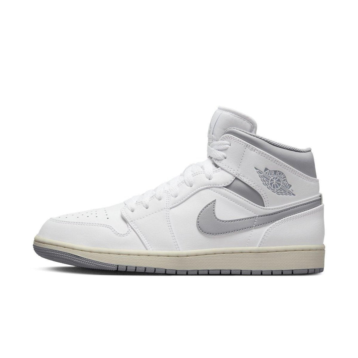 Air Jordan 1 Mid Neutral Grey featuring white leather and light grey accents, showcasing a stylish high-top design.