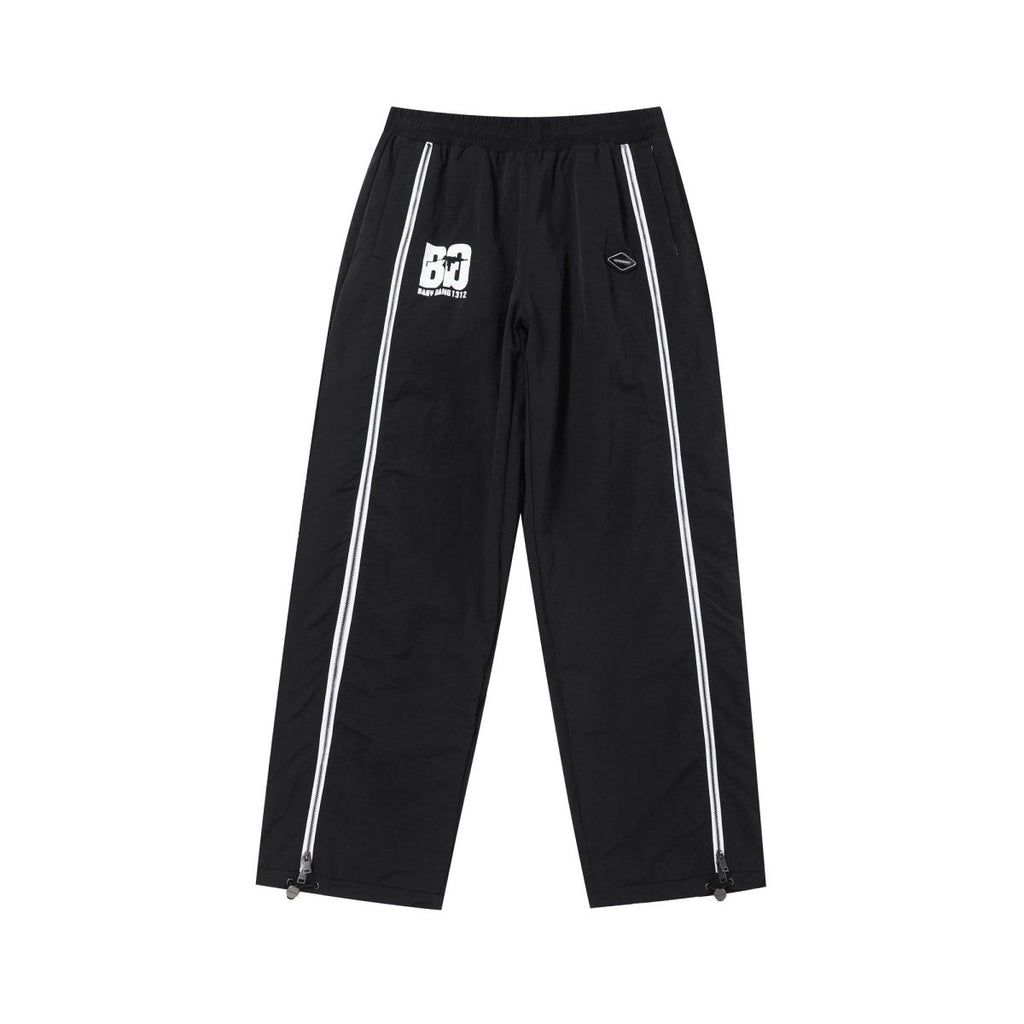Black/White NPT Baby Gang Zip Track Pants for stylish infants, featuring a comfortable fit and trendy design.