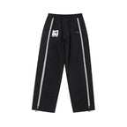 Black/White NPT Baby Gang Zip Track Pants for stylish infants, featuring a comfortable fit and trendy design.