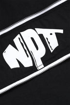 Close-up of the NPT logo on the Black/White Baby Gang Zip Track Top, showcasing stylish design and details.
