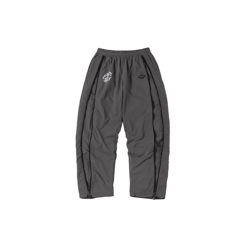 Grey and black NPT Simba La Rue zip track pants, featuring a relaxed fit and logo detail, perfect for casual wear.