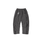 Grey and black NPT Simba La Rue zip track pants, featuring a relaxed fit and logo detail, perfect for casual wear.
