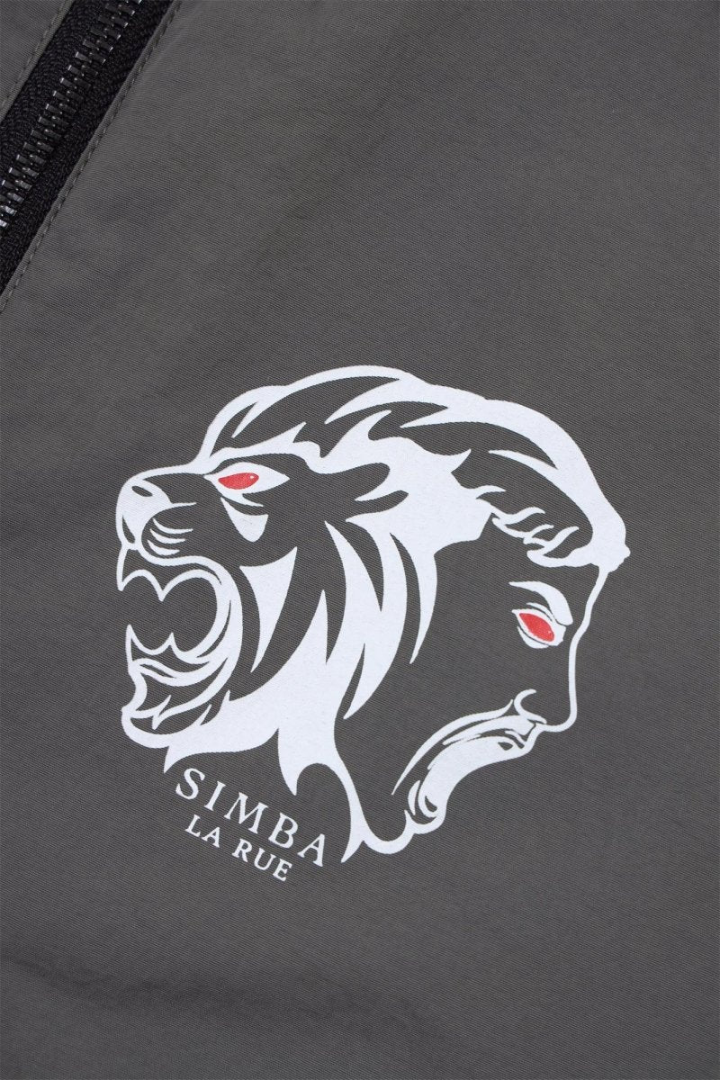 Grey track pants featuring Simba La Rue logo with lion design and red eyes, showcasing urban style and comfort.