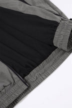 Close-up of the interior of the Grey/Black NPT Simba La Rue Zip Track Top showing soft fabric and zipper details.