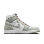 Air Jordan 1 High OG Seafoam (W) with premium leather and green accents for a stylish look.