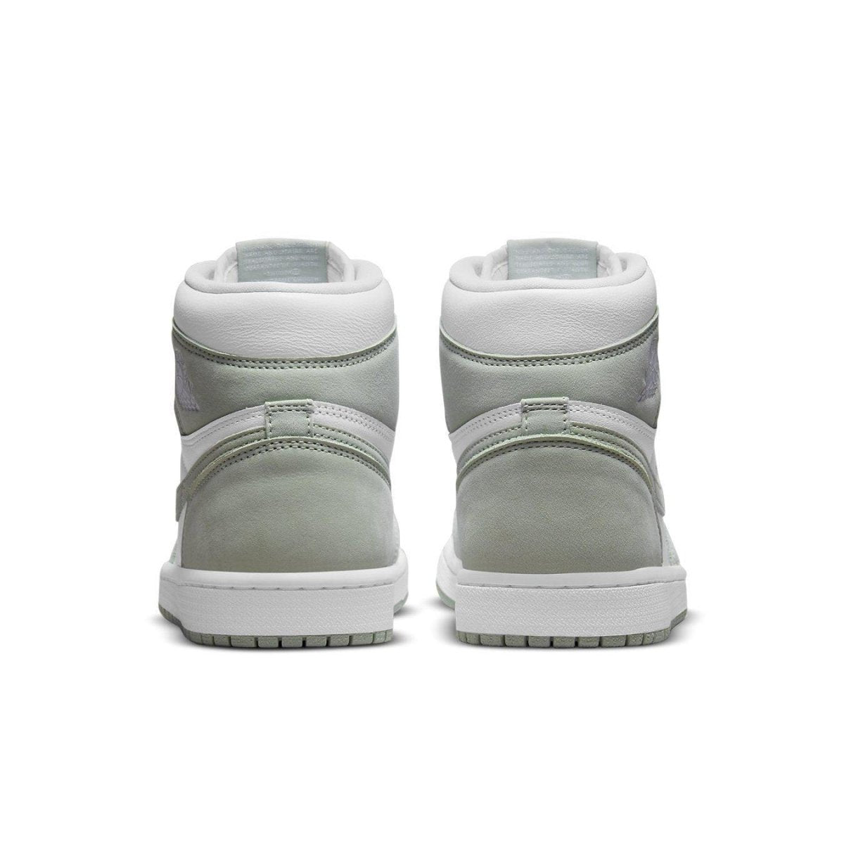 Back view of the Jordan 1 High OG Seafoam (W) sneakers showcasing premium leather and unique design.