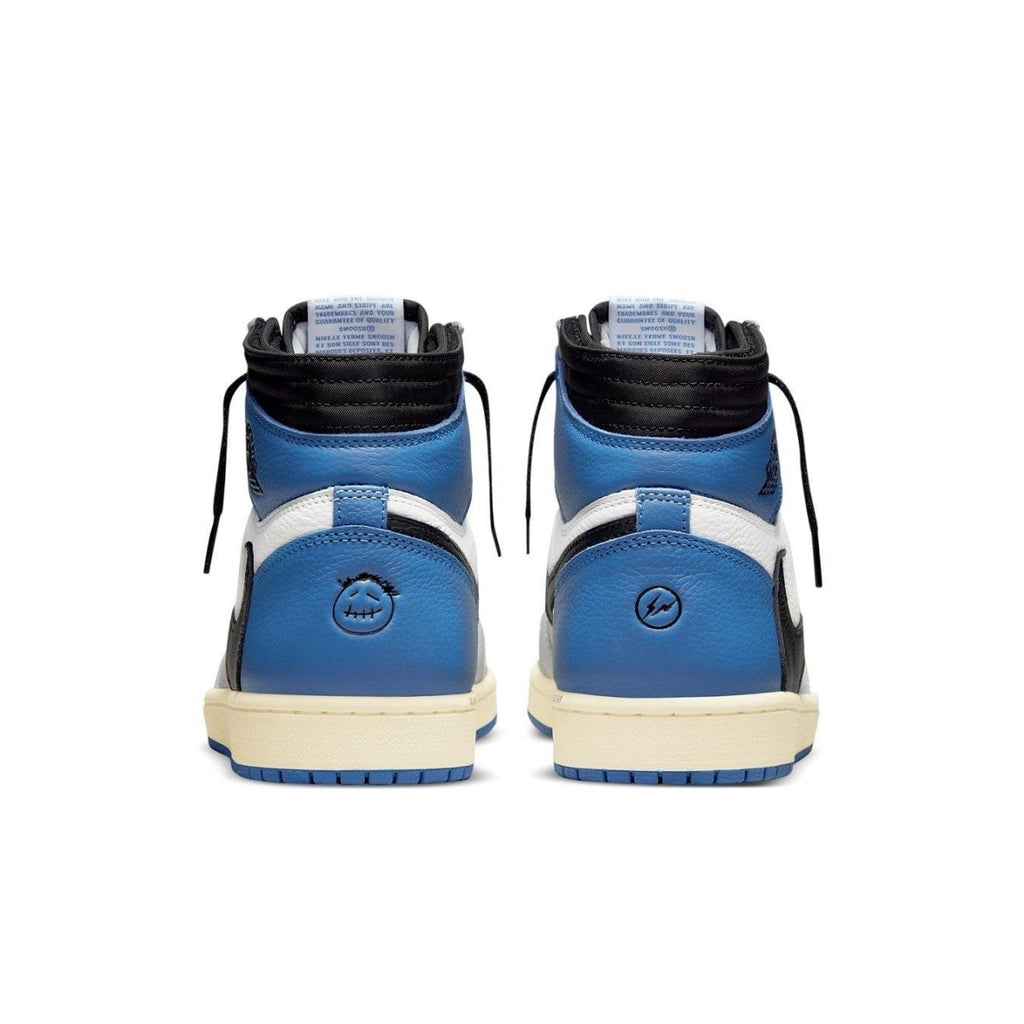 Back view of Air Jordan 1 High OG SP Fragment Design x Travis Scott sneakers in blue and black.