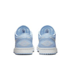 Jordan 1 Low Aluminum Women's sneakers, featuring a light blue back view and signature Jordan branding.