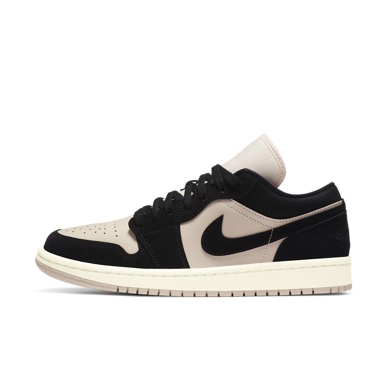 Jordan 1 Low Black Guava Ice (W) in black and beige suede, featuring stylish design and comfort for everyday wear.