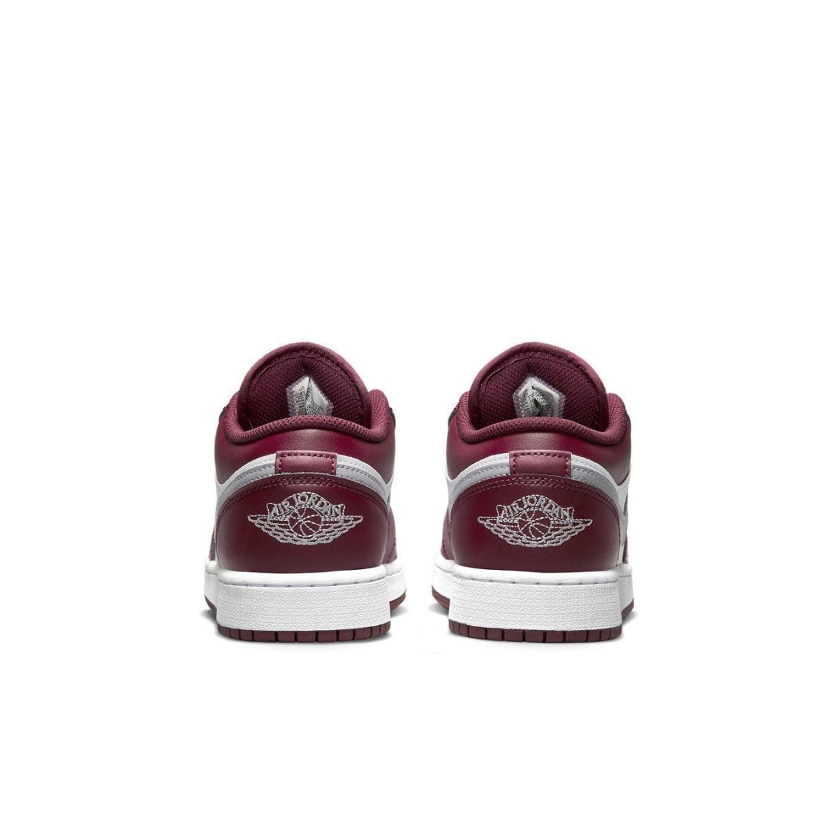 Rear view of Air Jordan 1 Low Bordeaux GS showing burgundy leather upper and iconic Jordan Wings logo details.