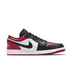 Jordan 1 Low Bred Toe sneaker featuring black, white, and red leather color blocking.